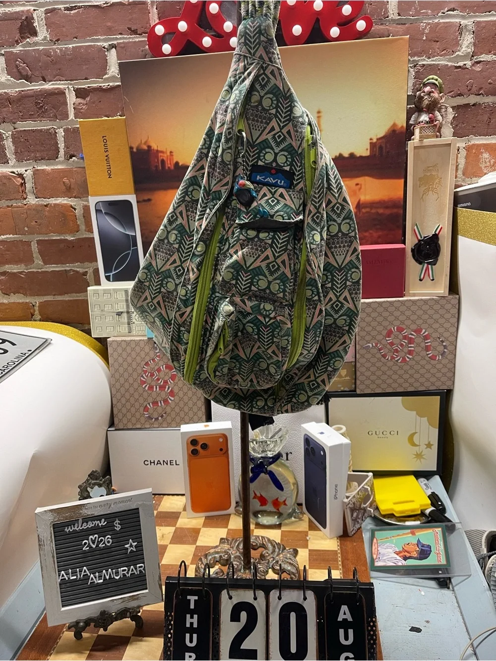 print KAVU Rope Bag featuring lime-green zippers and an owl motif accent.